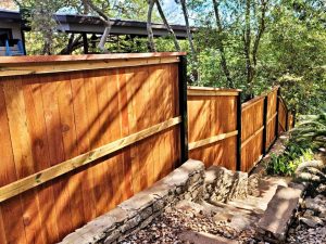 newly installed shadowbox privacy fence in residential backyard