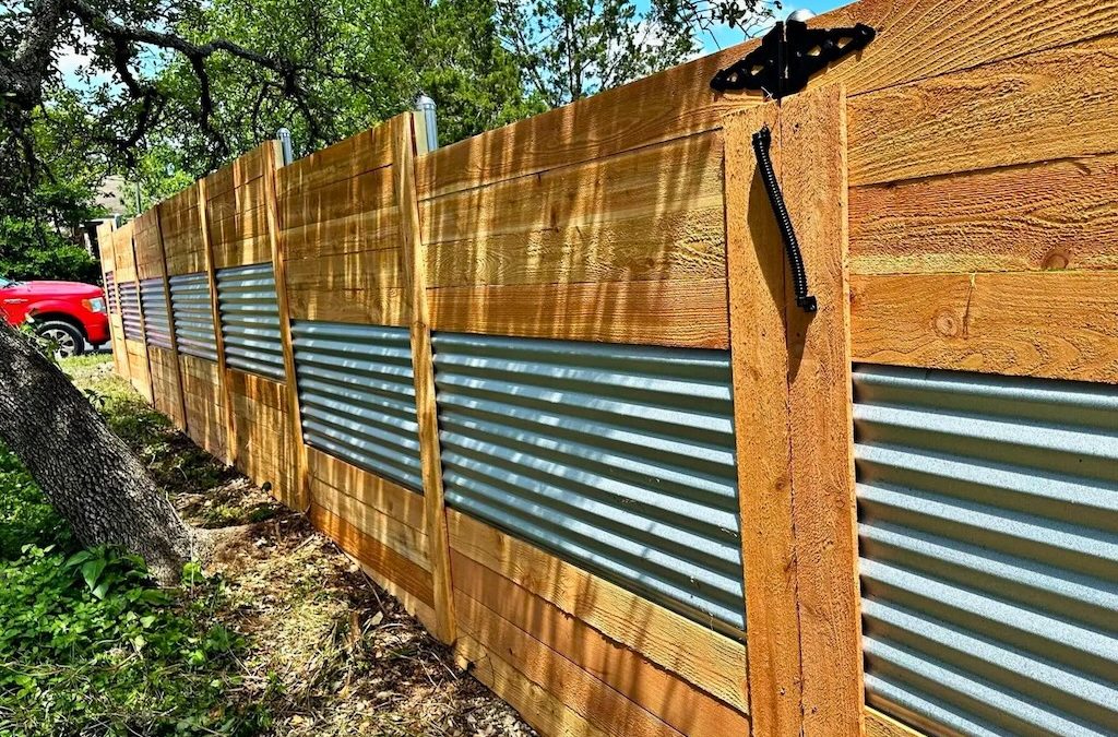 Modern wood fence replacement featuring corrugated metal panels for added durability