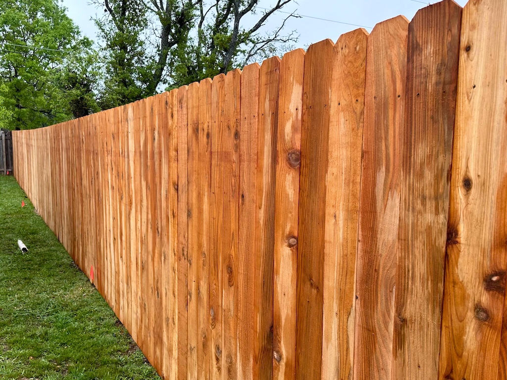 wooden privacy fence enclosing residential backyard